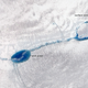 Illustration for article titled Melt Ponds on Ice Sheets Are Chillingly Beautiful